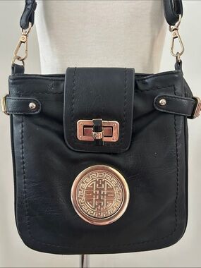 Black Faux Leather Shoulder Bag with Gold Asian Inspired Medallion